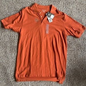 Brand new Large Tall St John’s Bay polo. Burnt orange color